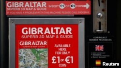 A vending machine selling tourist maps offers the chance to pay in pounds or euros in the British overseas territory of Gibraltar, historically claimed by Spain, April 20, 2017. 