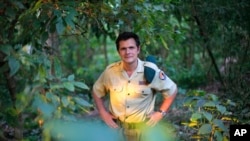 In this file photo taken on Wednesday, Aug. 11, 2012, Emmanuel de Merode, Virunga National Park director and chief warden, poses at the park headquarters in Rumangabo. The Belgian director of Africa's oldest national parkwas shot and seriously wounded by three. unknown assailants on Tuesday, April 15. He was traveling between Goma, a main city in the east near Rwanda's border, and Rumangabo at the time. (AP Photo/Jerome Delay,File)