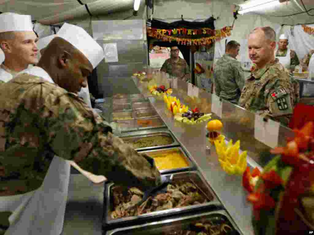 U.S. soldiers celebrate Thanksgiving with a traditional meal when they are stationed overseas. (Reuters)