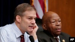 Rep. Jim Jordan of Ohio, the House Oversight and Reform Committee ranking Republican, left, and Chairman Elijah Cummings (Democrat-Maryland), right, are seen during a committee hearing on Capitol Hill in Washington, Feb. 26, 2019.