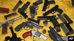 Assortment of firearms