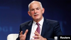 FILE - George Papandreou, former Greek prime minister, speaks at a panel discussion Las Vegas.