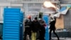 Protesters clash with police, in central Kyiv, Ukraine, Jan. 20, 2014.