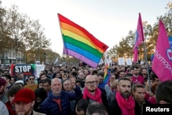 Members and supporters of the lesbian, gay, bisexual and transgender (LGBT) community protest against discrimination and violence, at the Place de la Republique in Paris, France, Oct. 21, 2018.