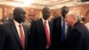 Members of South Sudan's rebel delegation talk with US Envoy to Sudan and South Sudan Donald E. Booth (R) on Jan. 4, 2014 during talks in Addis Ababa to try to broker a ceasefire between government and opposition forces.
