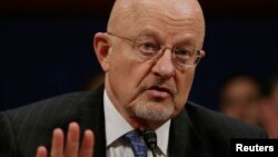 FILE - U.S. intelligence chief James Clapper appears before lawmakers on Capitoll Hill in Washington Feb. 4, 2014.