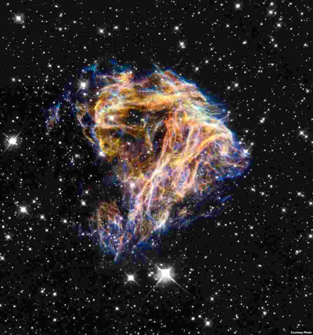 These delicate filaments are actually sheets of debris from a stellar explosion. (NASA)