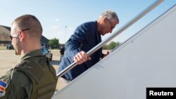 US Secretary of Defense Chuck Hagel boards an aircraft for a trip Middle East region at Andrews Air Force base near Washington, DC, April 20, 2013.