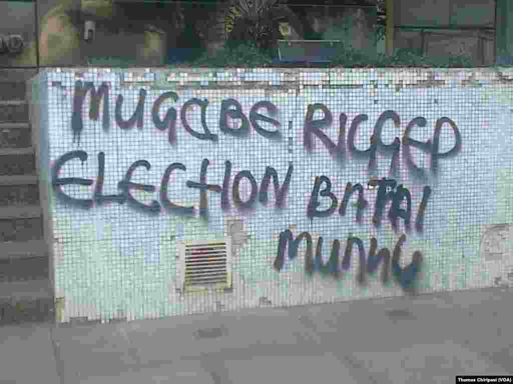 An accusatory graffito found on Harare streets Tuesday morning.