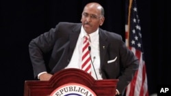 FILE - Michael Steele, then-Republican National Committee (RNC) chairman, announces that he is dropping his re-election bid, Jan. 14, 2011, during the Republican National Committee Winter Meeting in Oxon Hill, Md.