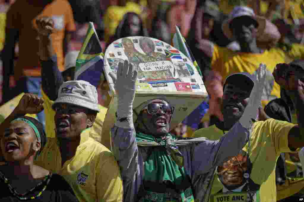 A supporter of the ruling African National Congress (ANC) attends the party&#39;s final election rally at Ellis Park stadium in Johannesburg, South Africa.