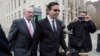 Former Honduran President Rafael Callejas, center, and his attorney Manuel Retureta, leave federal court in New York, March 28, 2016. 