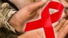Pita merah tanda peduli HIV/AIDS. (Foto: ilustrasi)