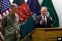 U.S. Defense Secretary James Mattis , right, and U.S. Army General John Nicholson, left, commander of U.S. Forces Afghanistan, hold a news conference at Resolute Support headquarters in Kabul, Afghanistan, April 24, 2017. Mattis arrived unannounced in Afghanistan.