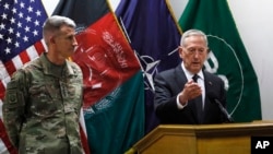 U.S. Defense Secretary James Mattis , right, and U.S. Army General John Nicholson, left, commander of U.S. Forces Afghanistan, hold a news conference at Resolute Support headquarters in Kabul, Afghanistan, April 24, 2017. Mattis arrived unannounced in Afg