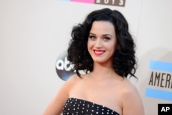 FILE - Katy Perry arrives at the American Music Awards at the Nokia Theater.