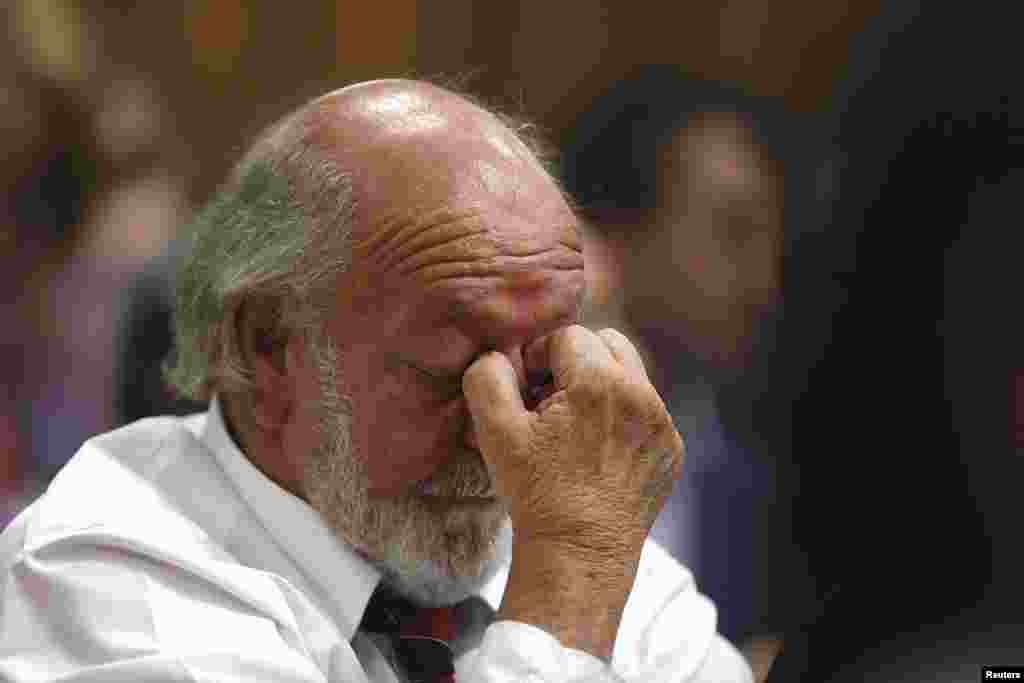 Barry Steenkamp, father of Reeva Steenkamp, reacts to the verdict, Sept. 12, 2014.