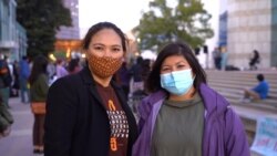 Tanny Jiraprapasuke (R) Walaipan Kesthong (L), members of Thai communities in Los Angeles attend the event and take part to raise awareness about the increase in hate crimes against Asians in the US at the Japanese American National Museum in Los Angeles,