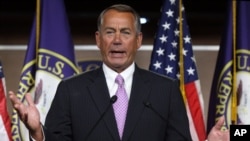 House Speaker John Boehner of Ohio gestures during a news conference on Capitol Hill in Washington, Jan. 8, 2015. 