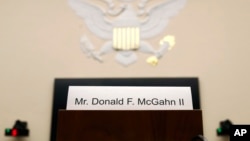 A placard is displayed for former White House Counsel Don McGahn, who did not appear before a House Judiciary Committee hearing, May 21, 2019, on Capitol Hill in Washington.
