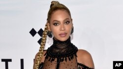 FILE - In this Oct. 15, 2016 photo, singer Beyonce Knowles attends the Tidal X: 1015 benefit concert in New York.