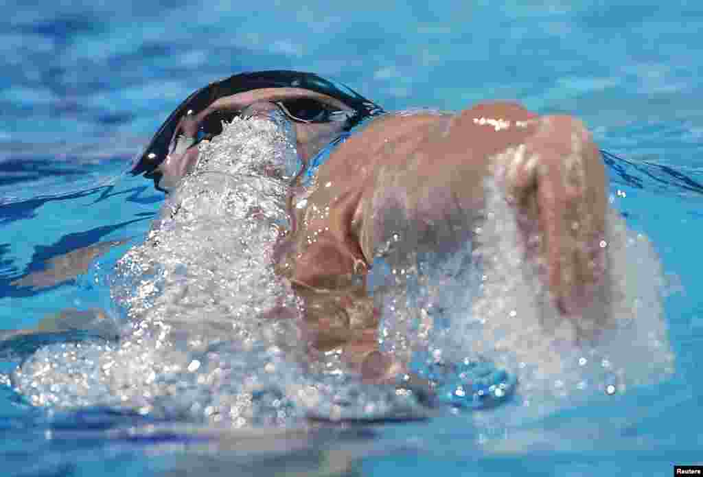 Tyler Clary of the U.S. swims in the men's 200m backstroke final during the World Swimming Championships at the Sant Jordi arena in Barcelona, Spain.