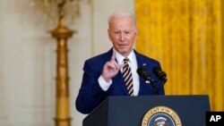 El presidente de Estados Unidos, Joe Biden, habla en una conferencia de prensa en la Sala Este de la Casa Blanca en Washington, el miércoles 19 de enero de 2022. 