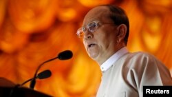 Burma's President Thein Sein gives a speech during a meeting with local civil society organizations in Diamond Jubilee Hall of Yangon University in Rangoon, Nov. 30, 2013. 