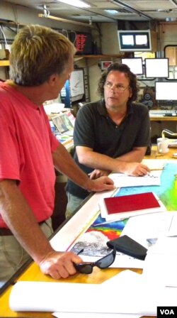 Lead author Yair Rosenthal from Rutgers University (R) and Jim Broda from Woods Hole Ocean Institute (L) in the science laboratory of R/V Knorr during a 2009 coring expedition to the Peruvian coast. (Roy Groething)
