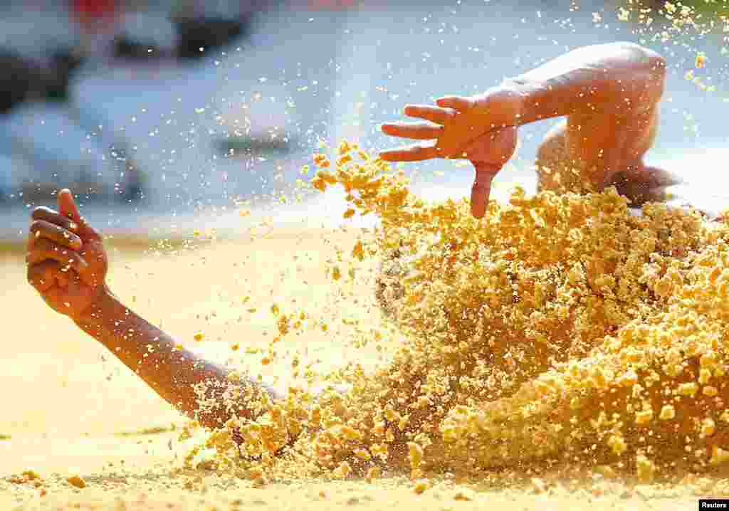 George Kitchens of the U.S. competes in the men&#39;s long jump qualifying round during the IAAF World Athletics Championships at the Luzhniki stadium in Moscow, Russia.