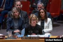 FILE - U.S. United Nations Ambassador Kelly Craft addresses the U.N. Security Council after a failed vote on a humanitarian draft resolution for Syria, Sept. 19, 2019, at U.N. headquarters, New York.