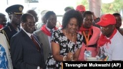 Zimbabwe Mugabe Birthday - First Lady Cuts Cake