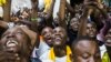 Supporters of newly re-elected Congo President Denis Sassou Nguesso celebrate his victory in Brazzaville on March 24, 2016 after the Independent Electoral Commission declared him the winner.