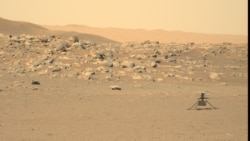 This file photo, captured by NASA's Perseverance rover, shows the Ingenuity helicopter on the surface of Mars. The image was received on June 15, 2021. (Credit: NASA/JPL-Caltech/ASU)