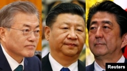 문재인 한국 대통령, 시진핑 중국 국가주석과 아베 신조 일본 총리. 