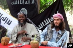 FILE - Mukhtar Robow, then a leader of the Somali militant group al-Shabab, is seen at a news conference at a farm in southern Mogadishu's Afgoye district in Somalia, May 11, 2011.