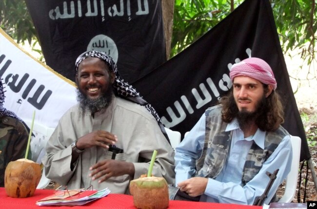 FILE - Mukhtar Robow, then a leader of the Somali militant group al-Shabab, is seen at a news conference at a farm in southern Mogadishu's Afgoye district in Somalia, May 11, 2011.