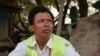លោក ឡុញ ប៊ុនធឿន ​ធ្វើការ​ជា​ជាង​សំណង់​ឆ្ងាយ​ពី​ផ្ទះ​កំណើត​របស់​លោក ដើម្បី​បង់​បំណុល​ដែល​លោក​បាន​ខ្ចី ក្នុង​អត្រាការ​ប្រាក់​ដែល​លោក​មិន​ទាន់​ដឹង​ថា​មាន​តម្លៃ​ប៉ុន្មាន។ (ខាន់ សុគុំមនោ/VOA) 