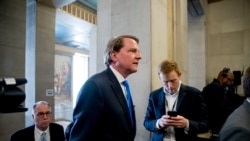 Former White House Counsel Don McGahn arrives for a farewell ceremony for Deputy Attorney General Rod Rosenstein in the Great Hall at the Department of Justice in Washington, Thursday, May 9, 2019.