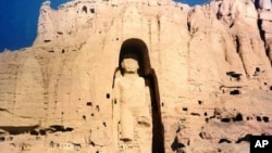 The 53-meter tall, 2,000-year-old Buddha statue located in Bamiyan, about 150 kilometers west of the Afghan capital Kabul, is shown in a November 28, 1997, photo