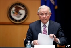 FILE - U.S. Attorney General Jeff Sessions prepares to speak before a meeting at the Department of Justice in Washington, April 18, 2017.