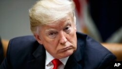 President Donald Trump speaks during a roundtable discussion in the Roosevelt Room of the White House, Dec. 18, 2018.