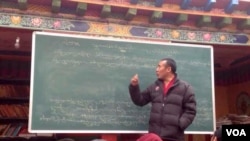Ngawang Jamyang, a Tibetan monk, age 45, who is said to have died in police custody in China, seen teaching, unknow location, undated.