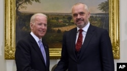 Vice President Joe Biden shakes hands with Albanian Prime Minister Edi Rama in the Roosevelt Room of the White House in Washington, April 14, 2016.