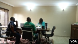 Emma Okene, CEO of Tracology, and his team meet to discuss how to move their startup company forward in Abuja, Nigeria, Sept. 5, 2016. Tracology is a payment management system that uses a barcode to allow users and the government to track utility bill pay