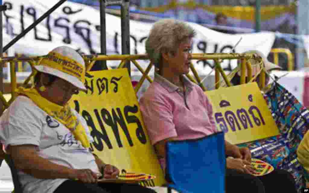 Anti-government demonstrators listen to speeches near Government House in Bangkok, Thailand. The People's Alliance for Democracy, also known as the "Yellow Shirts," are calling for marches later in the week in the capital as they pressure the government o