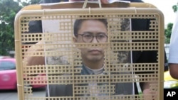 曼谷民运人士抗议拘捕刘贤斌
