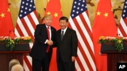 美國總統川普與中國國家主席習近平握手