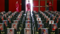 Graduating seniors of Brophy College Preparatory wait their turn to walk down the aisle to the stage individually during Diploma Days due to the coronavirus in Phoenix, Arizona, May 28, 2020.