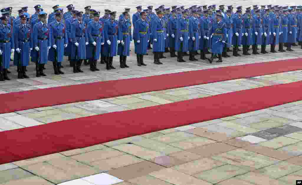 Members of the Serbian Honor guard prepare for the welcoming ceremony for Austrian Chancellor Christian Kern, in Belgrade, Serbia.